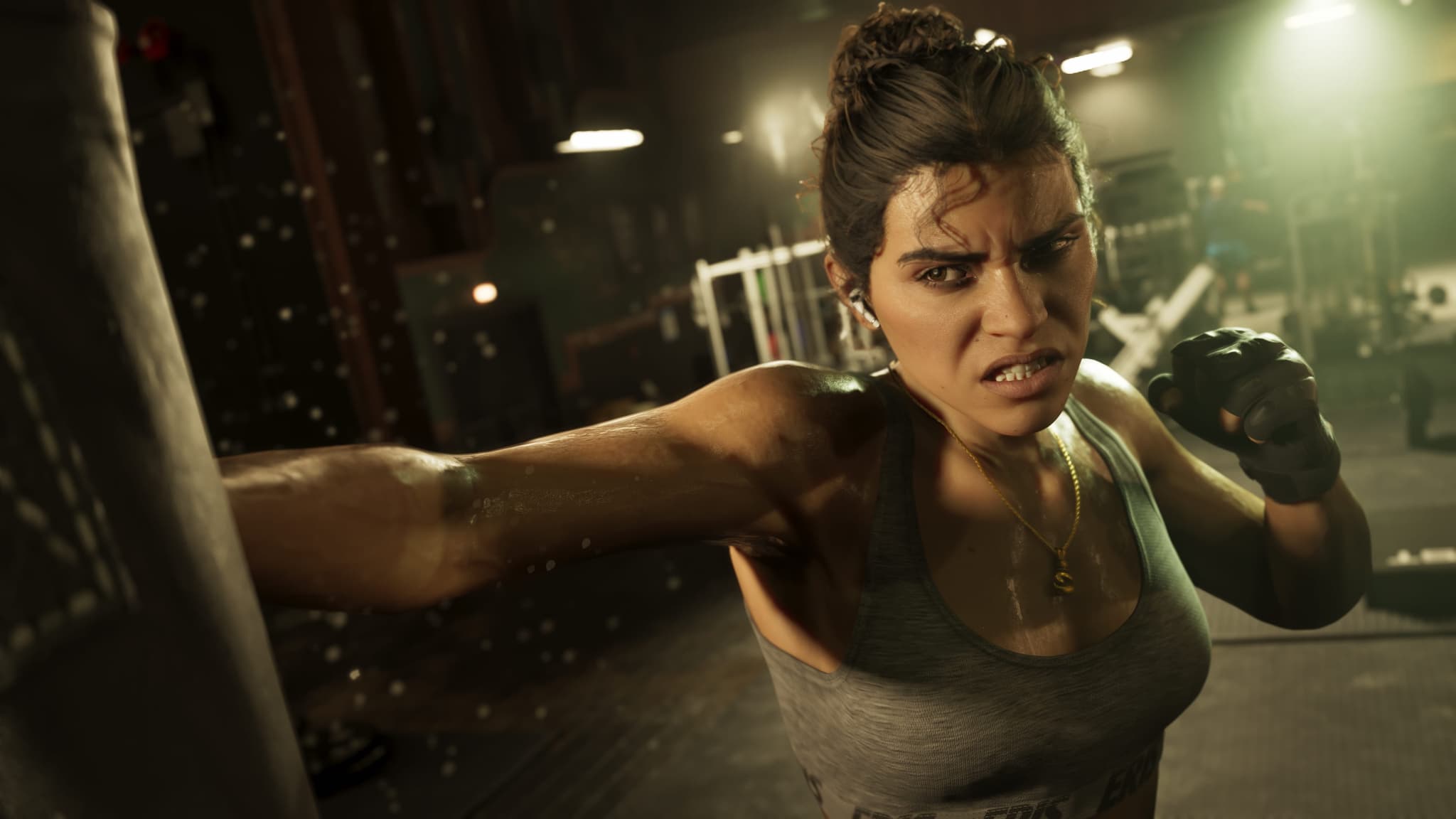 Lucia throwing a punch at a heavy bag in a gym in GTA 6